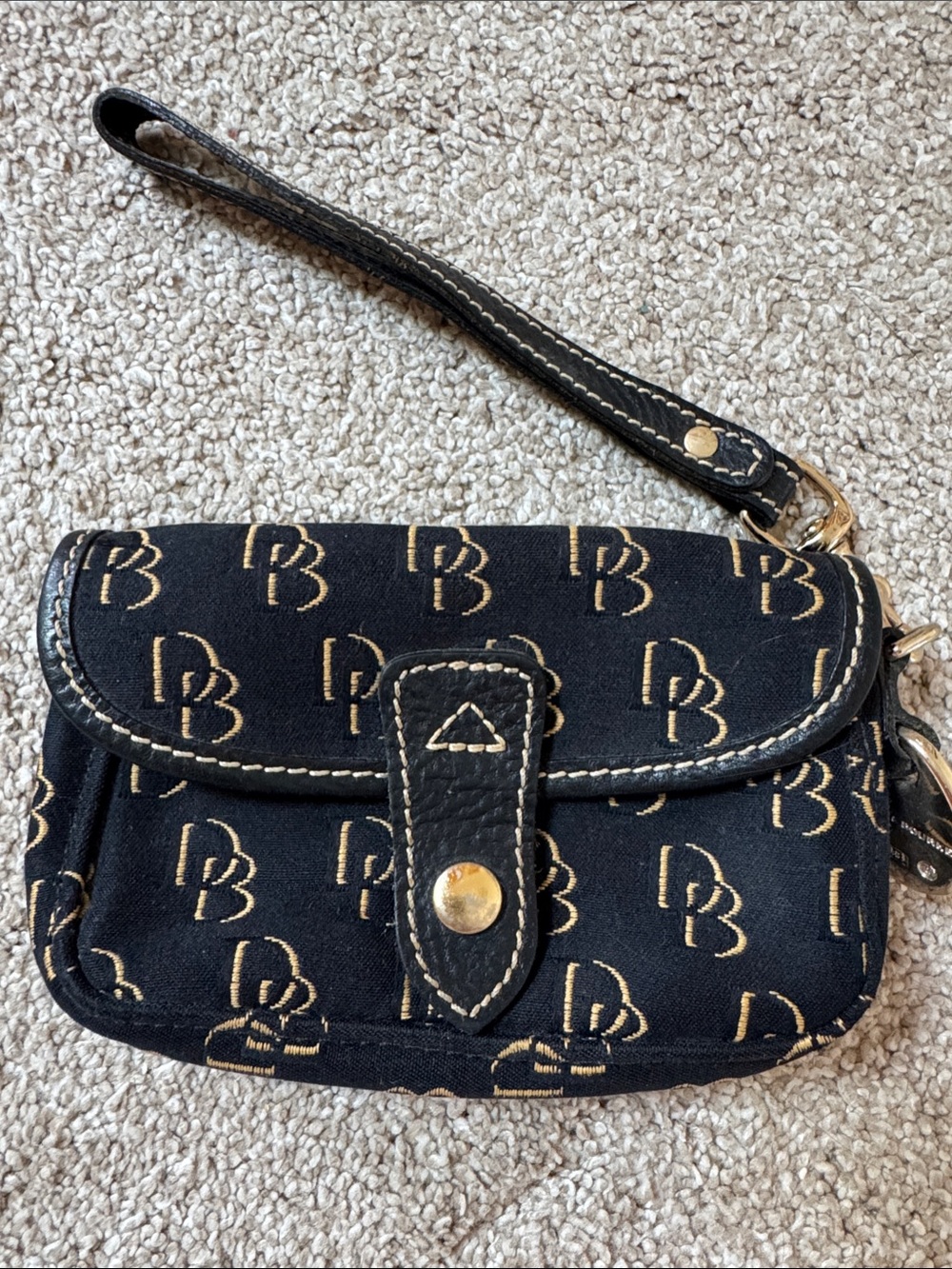Dooney & Bourke Black and Gold Signature Wristlet